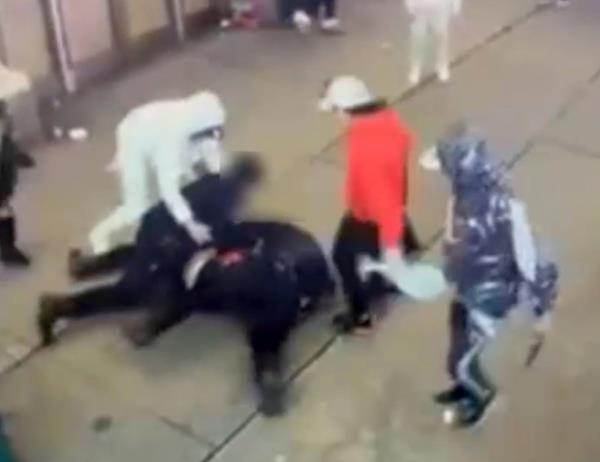 Shocking video captured the moment a migrant mob pounded a pair of cops near Times Square over the weekend — but the busted cowardly suspects were still released back o<em></em>nto the street without bail, sources say.
