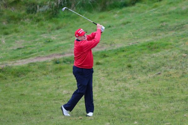 Former U.S. President and Republican presidential candidate Do<em></em>nald Trump plays golf at Trump Internatio<em></em>nal Golf l<em></em>inks