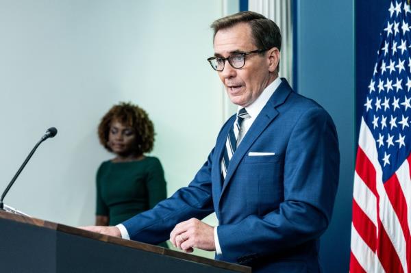 White House Natio<em></em>nal Security Communications Advisor John Kirby speaking, with White House Press Secretary Karine Jean-Pierre standing on the side, at a press briefing in the White House Press Briefing Room at the White House in Washington, DC.