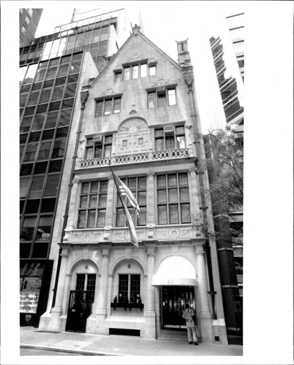 A building with flags on the front, known as the Friars Club, captured in August 1992