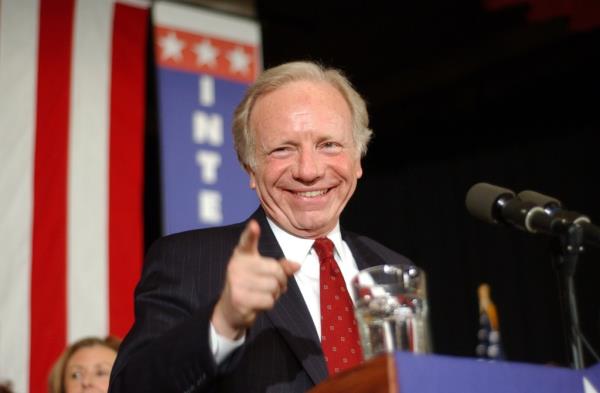Senator Joe Lieberman greets his supporters  at the Manchester Institute of Arts and Sciences after the New  Hampshire Primary election 
