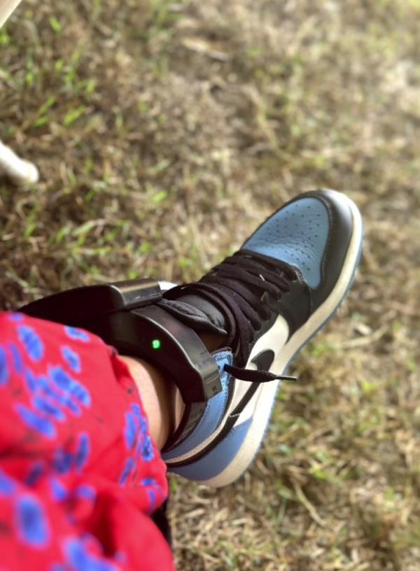 In the video slideshow, Mosby is seen wearing an ankle mo<em></em>nitor at the barbecue even though she was sentenced to a year of house arrest.