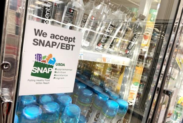 Sign in CVS store stating 'we accept SNAP EBT' in Paramus, NJ on October 5, 2022