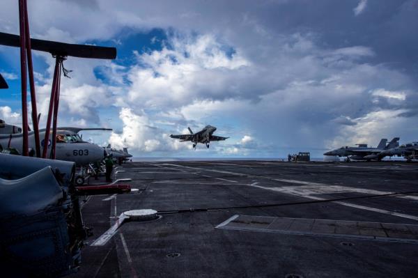 The USS Abraham Lincoln, which carriers F-35 fighter jets, will remain in the Middle East.