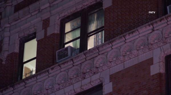 Police believe the suspect fell from an open window. 