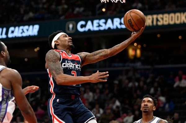 Washington Wizards guard Bradley Beal (3) scores against the Sacramento Kings during the second half at Capital One Arena.