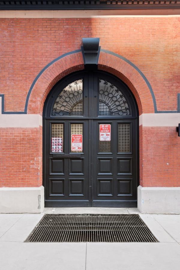 The arched front door.