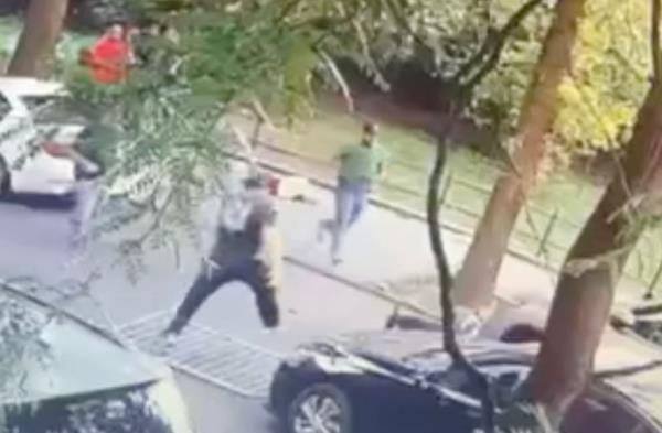 Surveillance footage showing Duran throwing cooler