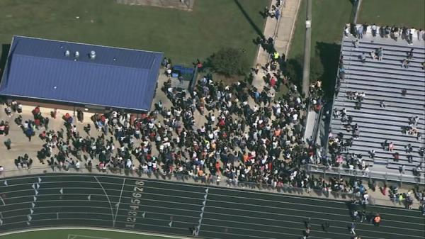 The scene outside Apalachee High School after students were evacuated from the halls.