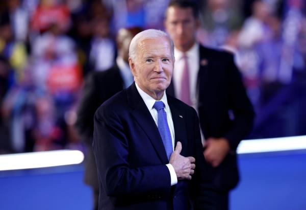 President Biden acknowledges applause after the President's speech during the first day of the Democratic Natio<em></em>nal Co<em></em>nvention at the United Center on Aug. 19, 2024 in Chicago, Illinois.  