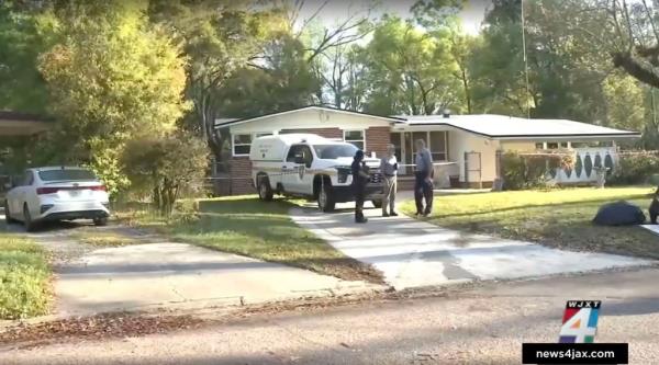 Law enforcement seen outside home wher<em></em>e body was found 