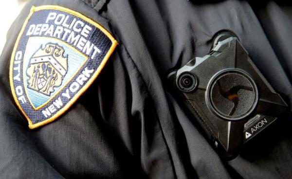 A NYPD officer wear a body-cam