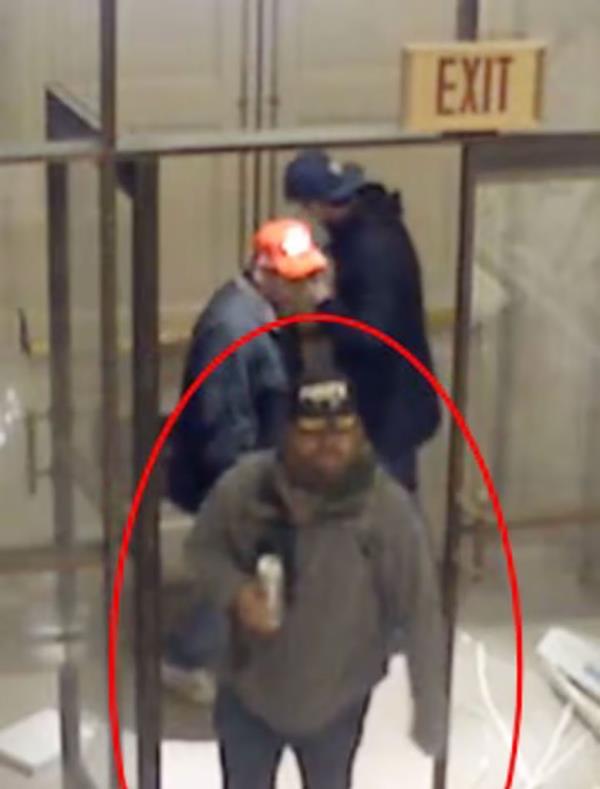 Surveillance footage, however, shows Adkins allegedly wandering through the building after walking through the breached Senate Wing Door.
