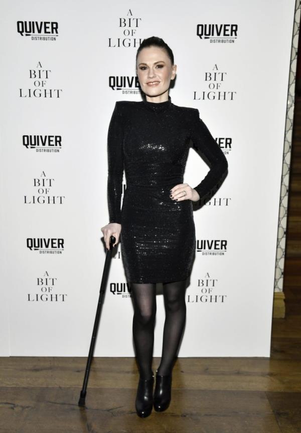 Anna Paquin, Oscar-winning actress, attending the New York premiere of 'A Bit of Light' in a black dress and using a cane