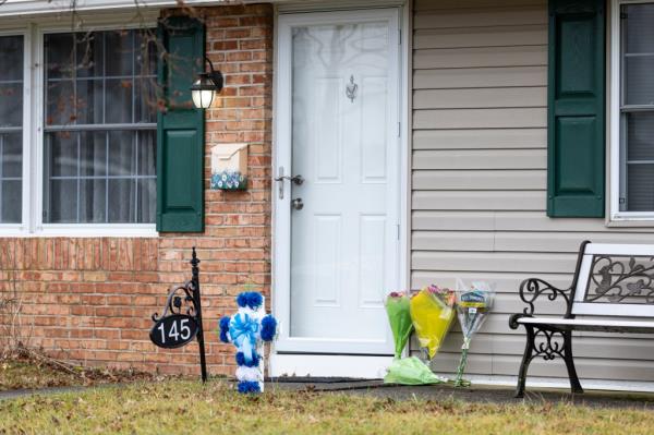 Flowers outside Levittown, Pa. house wher<em></em>e the murder took place.