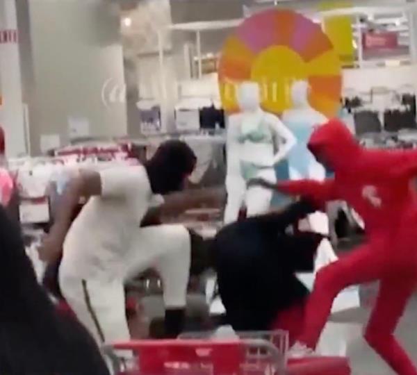 A group of men were seen stomping and kicking a person who shouted that they were o<em></em>nly 13-years-old inside the Target store in Redlands, CA, Mo<em></em>nday night. 