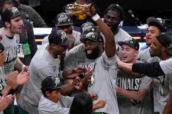 The Celtics celebrate after beating the Pacers on /May 27, 2024 