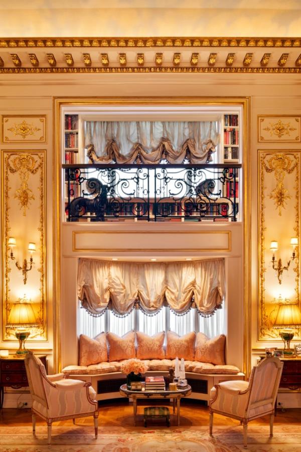 Interior of a curtained sitting area. 