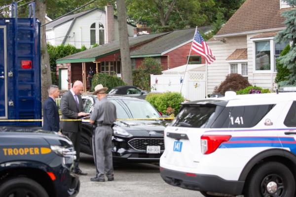 Police search home of Rex Heuermann.