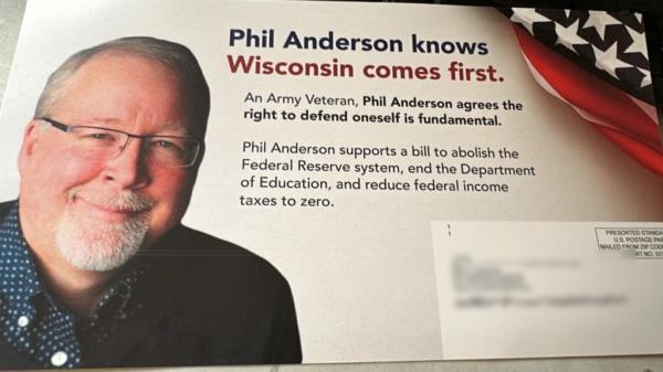 Mailers on a table promoting U.S. Senate Libertarian candidate Phillip Anderson, disavowed as a tactic by Democrats to influence Wisco<em></em>nsin voters