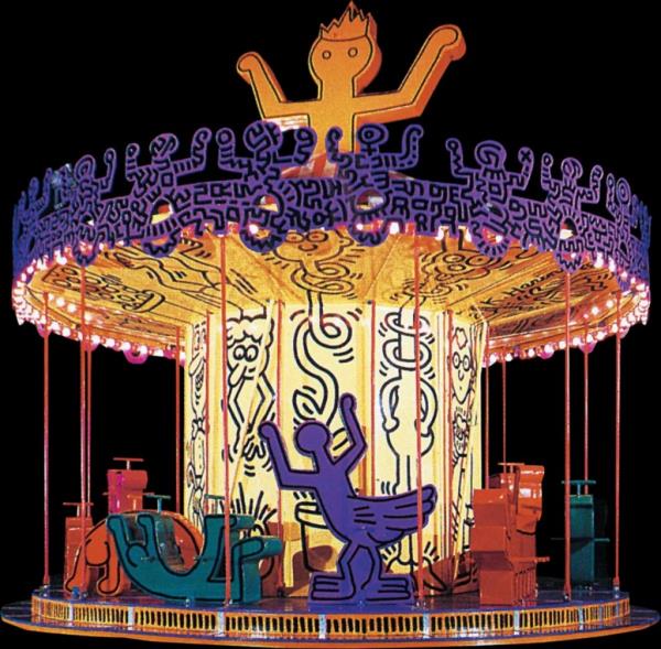 A carousel featuring work by the artist Keith Haring at Luna Luna amusement park.