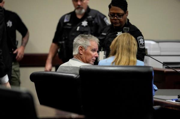 Colin Gray was arrested and charged with four counts of manslaughter, two counts of second-degree murder and eight counts of cruelty to children.