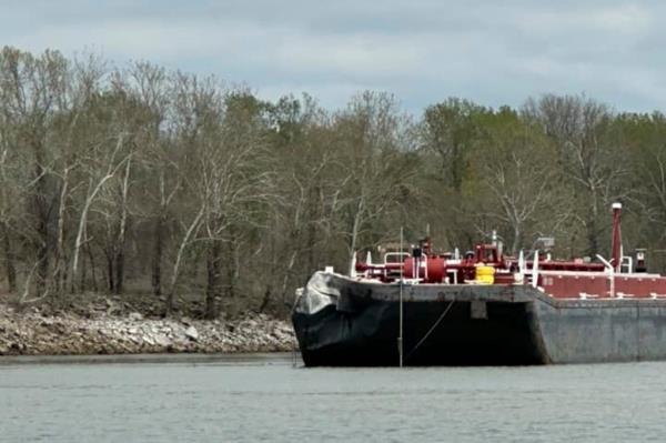 There were no reports of injuries on the highway or the barge.