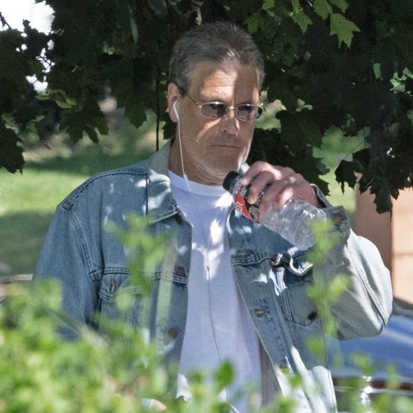 Chambers appeared to be wearing a wedding band on his left hand as he talked on the phone