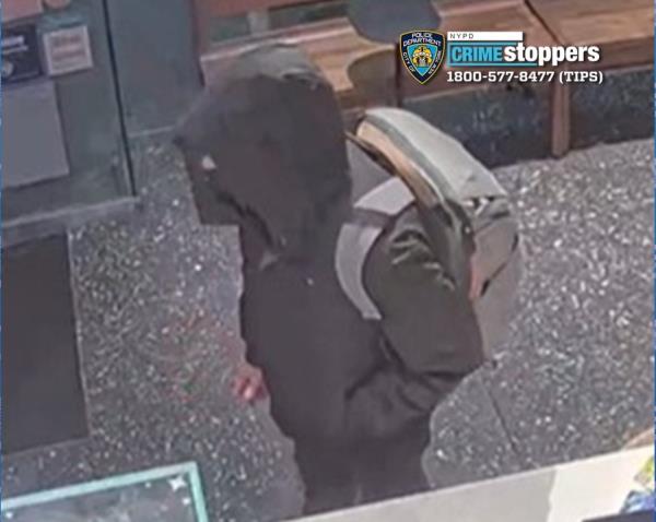 The suspect seen leaving a Starbucks.