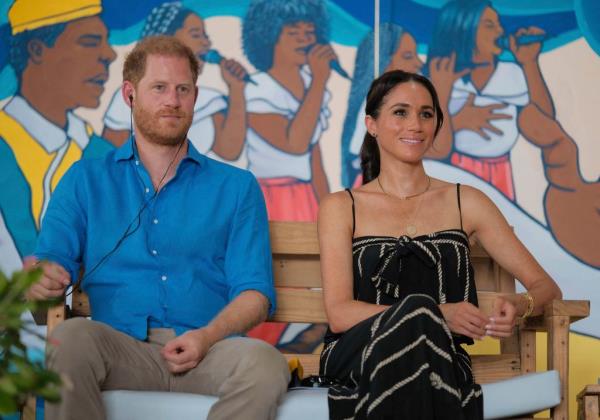Prince Harry and Meghan visited a Caribbean drumming school in Cartagena, wher<em></em>e they enthusiastically joined the local community in a lively drumming session.