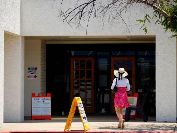 A voter arrives to the polls at Phoenix Bible Church on July 30, 2024, in Phoenix.
