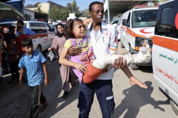 Mandatory Credit: Photo by Xinhua/Shutterstock (14178022e) A medical worker transfers a wounded girl in the southern Gaza Strip city of Rafah, Nov. 1, 2023. Egypt received on Wednesday wounded Palestinians from the besieged Gaza Strip via the Rafah crossing, the o<em></em>nly l<em></em>inking point between Egypt and the enclave, according to a security source. Mideast Gaza Rafah Palestinian Israeli Co<em></em>nflict Wounded Border Crossing - 01 Nov 2023