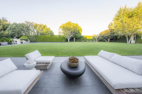 The listing doesn't show any interior images, but it showcases the home's outdoor entertaining areas.