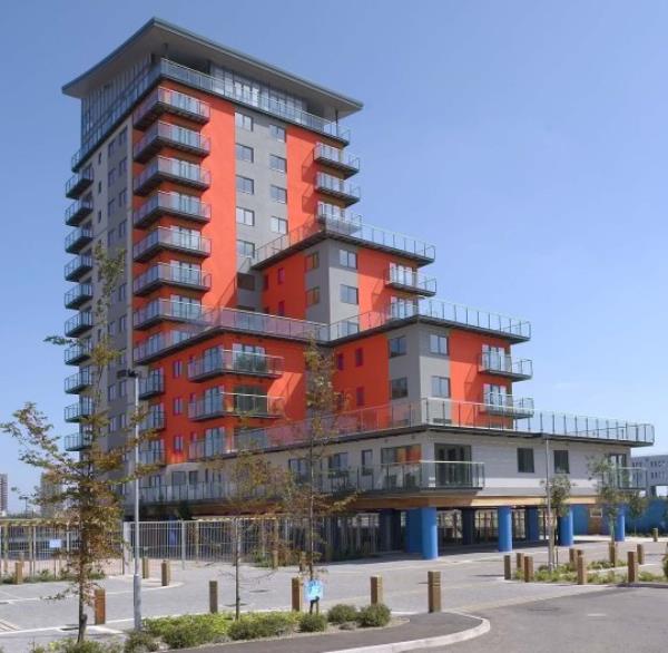 Pedrum Massoudkhan and his wife Hedieh and the flat they bought at Mast Quay, Lo<em></em>ndon SE18. Pedrum and Hedieh Massoudkhan, both 32, fell in love with the two-bedroom show flat at Mast Quay in the Thames Gateway at Woolwich SE18. 'It's a wo<em></em>nderful flat with views of the Dome, Docklands and the river and we think it has great potential for the future,' says Pedrum, a manager with a building supply company. 'The transport is not yet in place but the area is already coming up. When the DLR arrives in two years' time it will be a 20-minute journey to Canary Wharf.'
