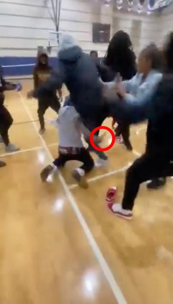 The violence spilled into the gymnasium, wher<em></em>e two students were stabbed.