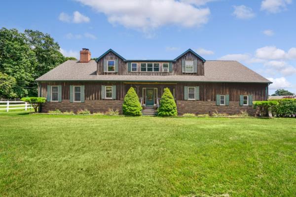 A 5-bedroom home is on the 14.8 acre property.