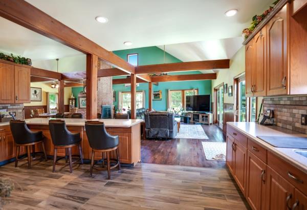 Beams add detail to the open kitchen