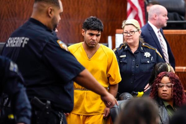 Johan Jose Rangel-Martinez, one of the two men accused of killing 12-year-old Jocelyn Nungaray, is led from the courtroom by deputies on Tuesday, June 25, 2024 in Houston. 