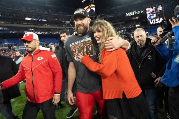 Travis Kelce and Taylor Swift walk together after an AFC Champio<em></em>nship NFL football game between the Chiefs and the Baltimore Ravens, Jan. 28, 2024, in Baltimore.