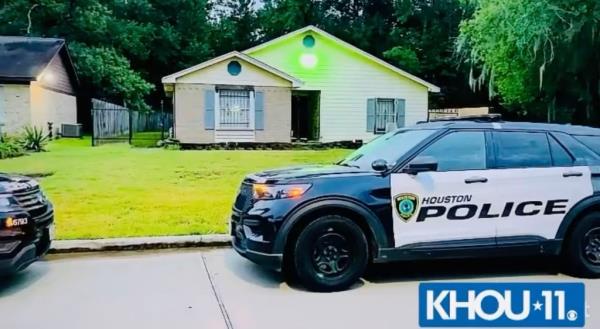 Police could be seen outside Janie Santana's home early Thursday. 