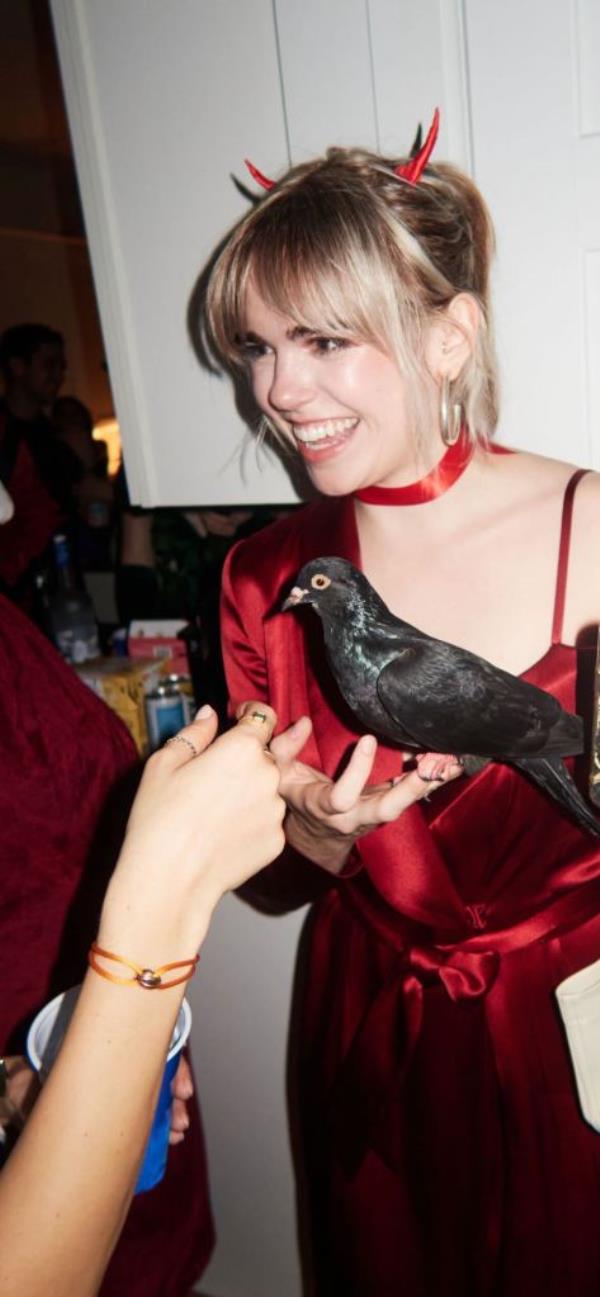 Abby Jardine, 26, from Brooklyn, and her pet pigeon, Pidge. 