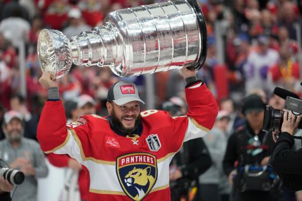 Florida Panthers right wing Kyle Okposo lifts the Stanley Cup in June