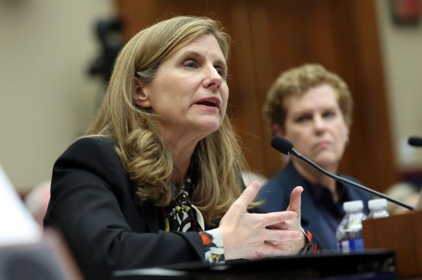 University of Pennsylvania president Liz Magill testifying at a microphone