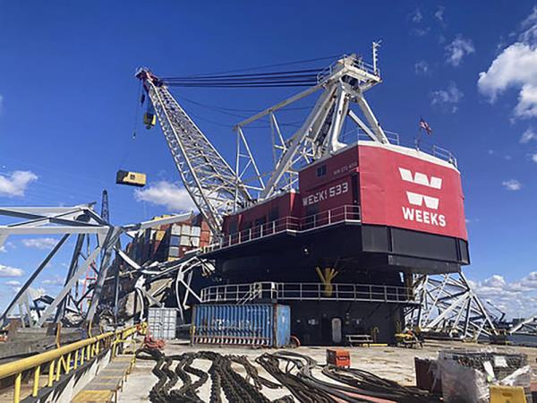 Crews were progressing toward removing sections of the Francis Scott Key Bridge that lie across the ship’s bow so that it could move on April 6, 2024, in Baltimore. 