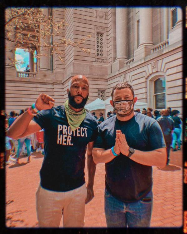 Michael Latt alo<em></em>ngside rapper Common, at a rally for Breo<em></em>nna Taylor in Kentucky in 2020.