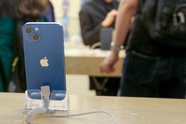 iPhone on display at an Apple store.