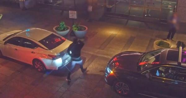 The suspect is seen fleeing the scene and rushing into the stolen SUV before driving to the hospital.