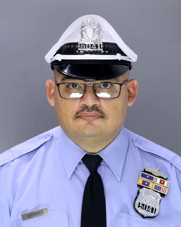 Philadelphia Officer Richard Mendez, 50, was shot and killed Thursday upon intervening in a vehicle break-in while arriving for his shift at the Philadelphia Internatio<em></em>nal Airport, police said.  