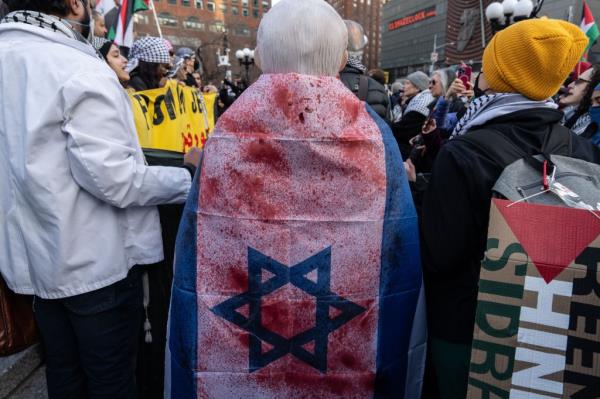 People take part in a pro-Palestine protest to mark Internatio<em></em>nal Woman's Day in Manhattan, New York. 08 March 2024.