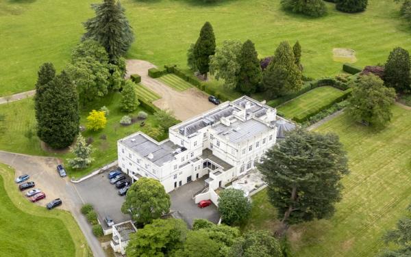 A large white building, the Royal Lodge, located in Windsor Great Park, the home of Prince Andrew The Duke of York and his ex wife Sarah The Duchess of York.